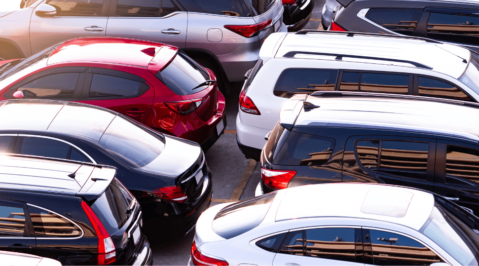 A variety of cars parked in a parking lot show some of the most stolen vehicles of 2023.