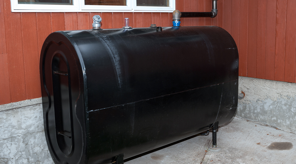 Here's how to maintain your oil tank and insure your property against oil spills, as shown by a black oil tank