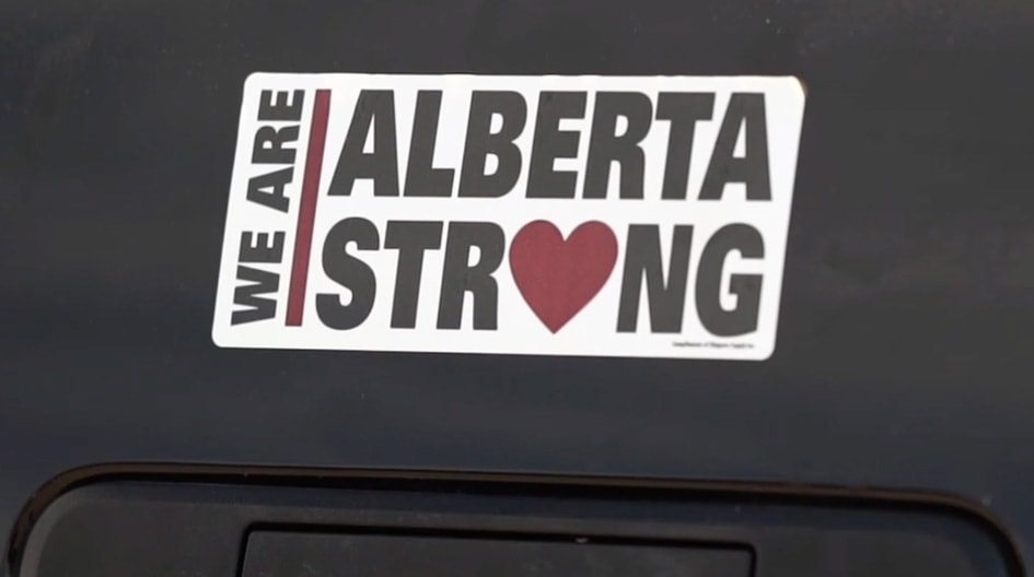 A bumper sticker with the words "We are Alberta Strong"