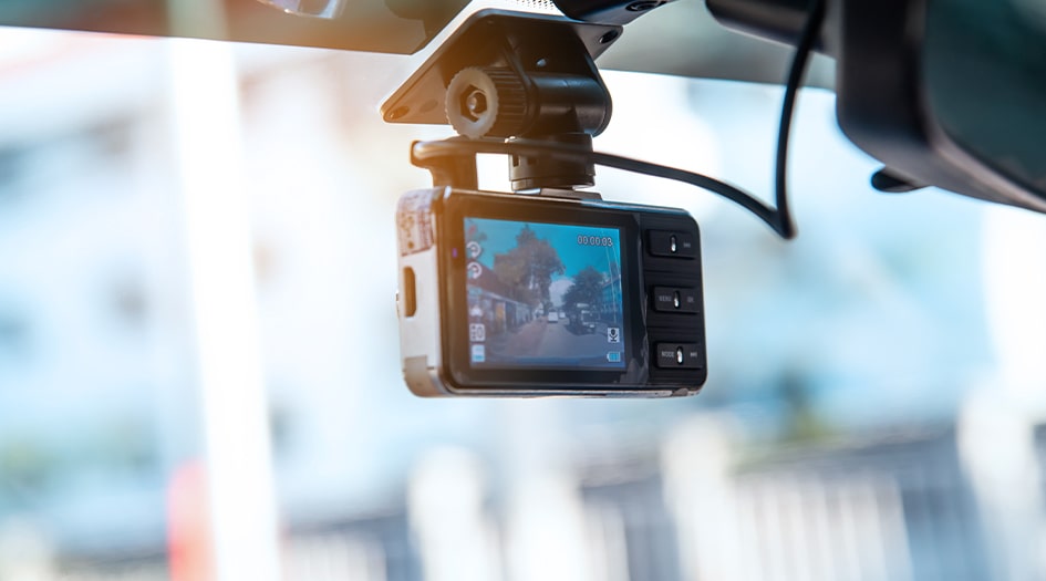This close up of a dash cam shows how installing a dash cam can affect your car insurance