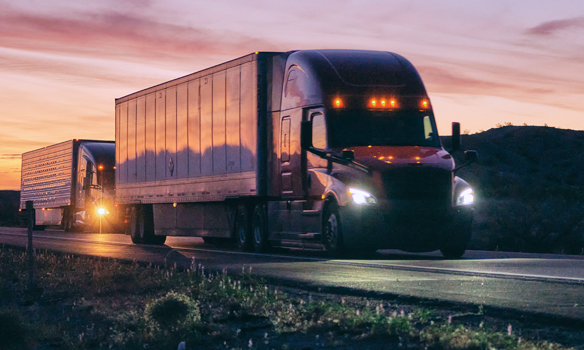 A transport truck cruising on the freeway