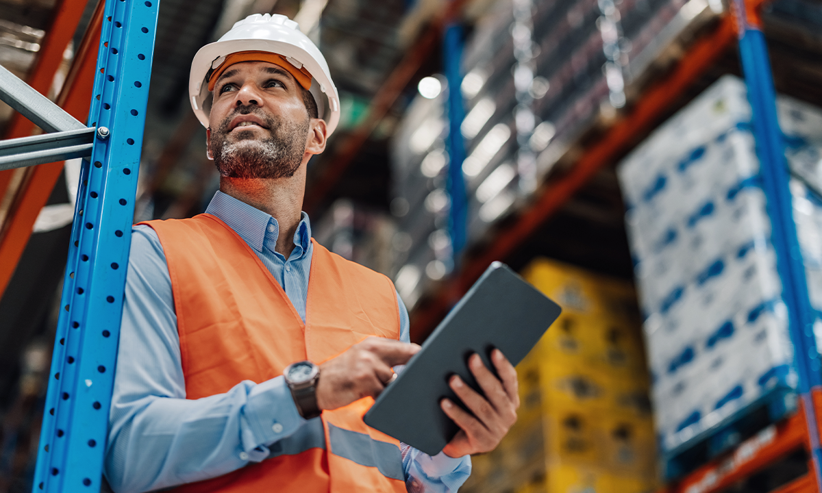 A person holding a clipboard on the jobsite