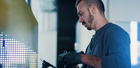 Man working in tech manufacturing