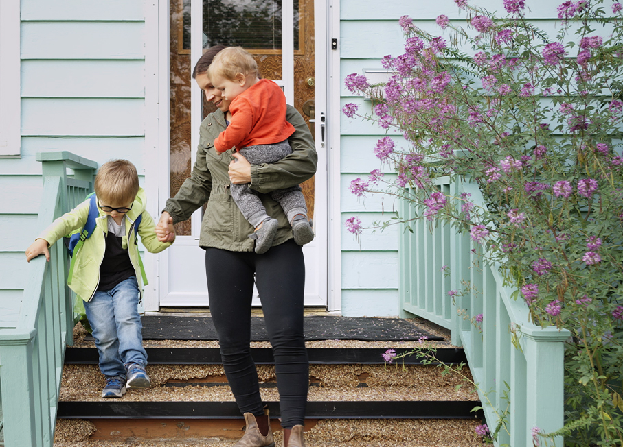 Family in front of their home