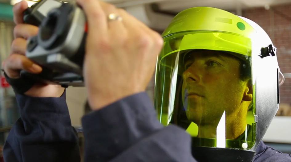 An Economical employee conducts a thermographic inspection